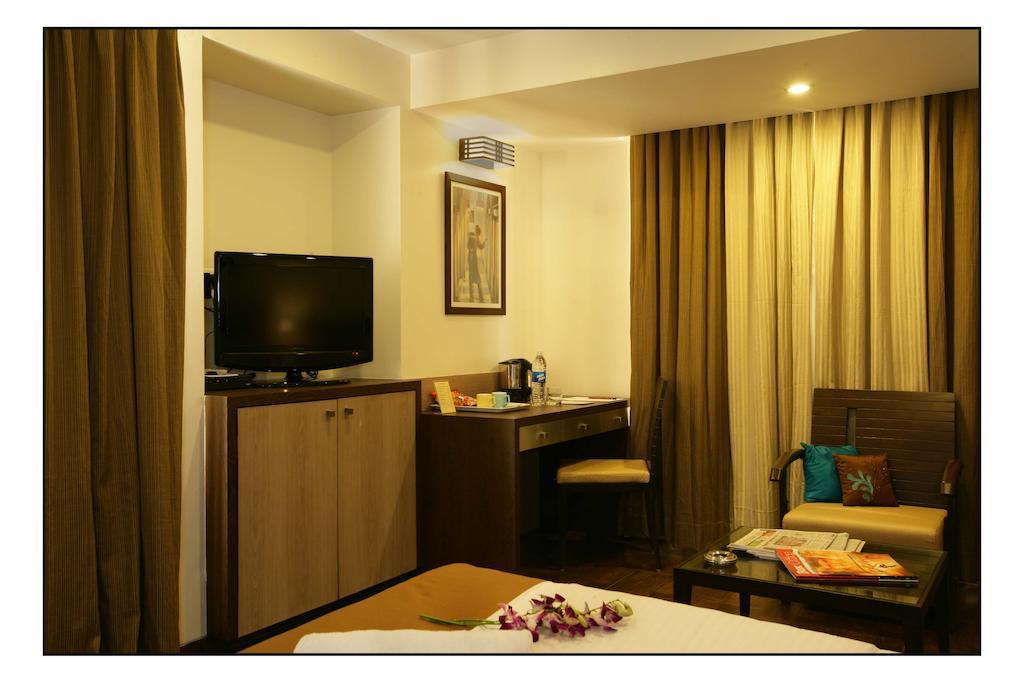 Hotel Utsav Deluxe Pune Cameră foto